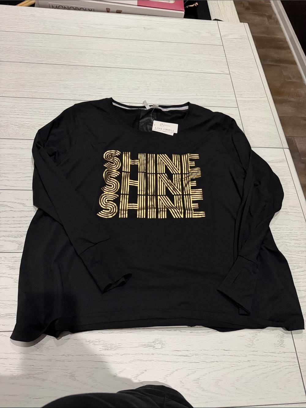 Live Well Women’s Black Long Sleeve Tee with Gold 'SHINE' Print